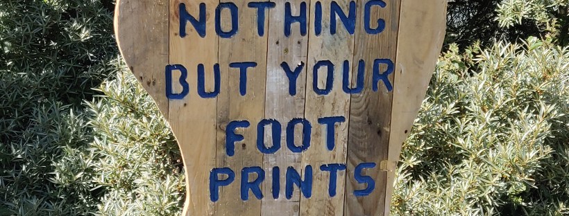 Footprint shaped sign at Gullane Bents